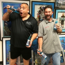 Rocket Fizz co-founder Ryan and TV show star Wayde King of the Animal Planet TV show Tanked. Rocket Fizz bottles their blue cream soda.
